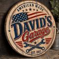 Close up of David's Garage patriotic bourbon barrel lid sign showing distressed wood grain and EST. 2017