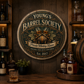 Personalized Barrel Society bourbon barrel lid sign displayed in a whiskey lounge