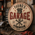 Personalized garage bourbon barrel lid sign displayed with tools in a workshop